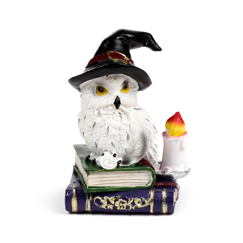 Wise Old Magical Owl on books - Olleke Wizarding Shop Amsterdam