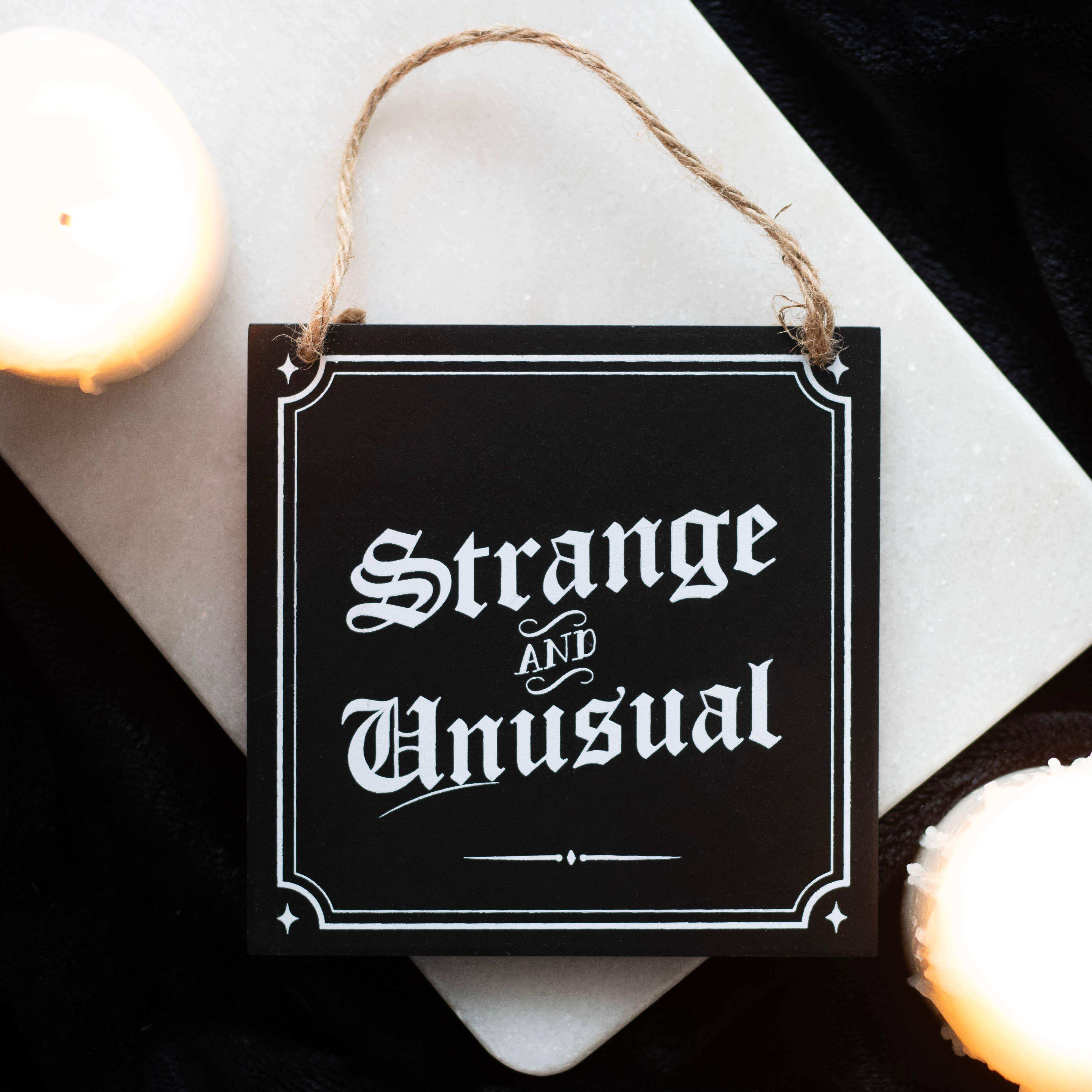 Strange and Unusual Hanging Sign - Olleke Wizarding Shop Amsterdam