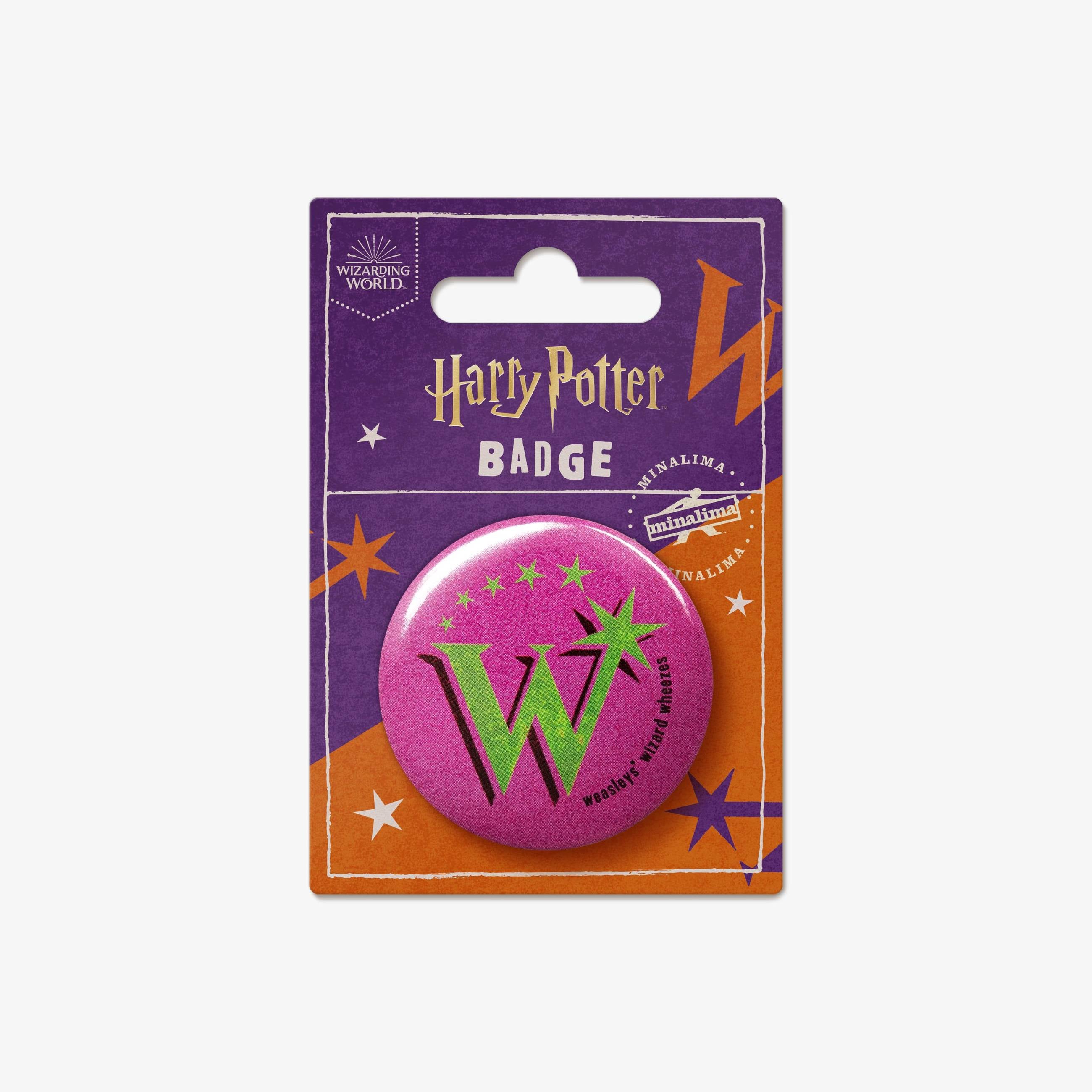 Badge avec le logo « W » de Weasley's Wizard Wheezes